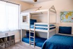 Bedroom 3 is a cool kids space with a bunk bed and a twin